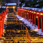 The lantern-lined steps in winter snow in Kibune at night